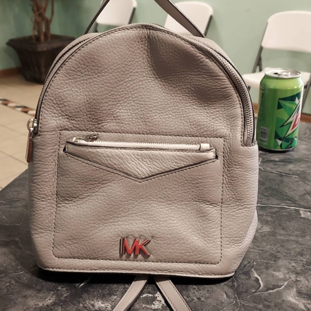 Sm backpack or cross mk purse